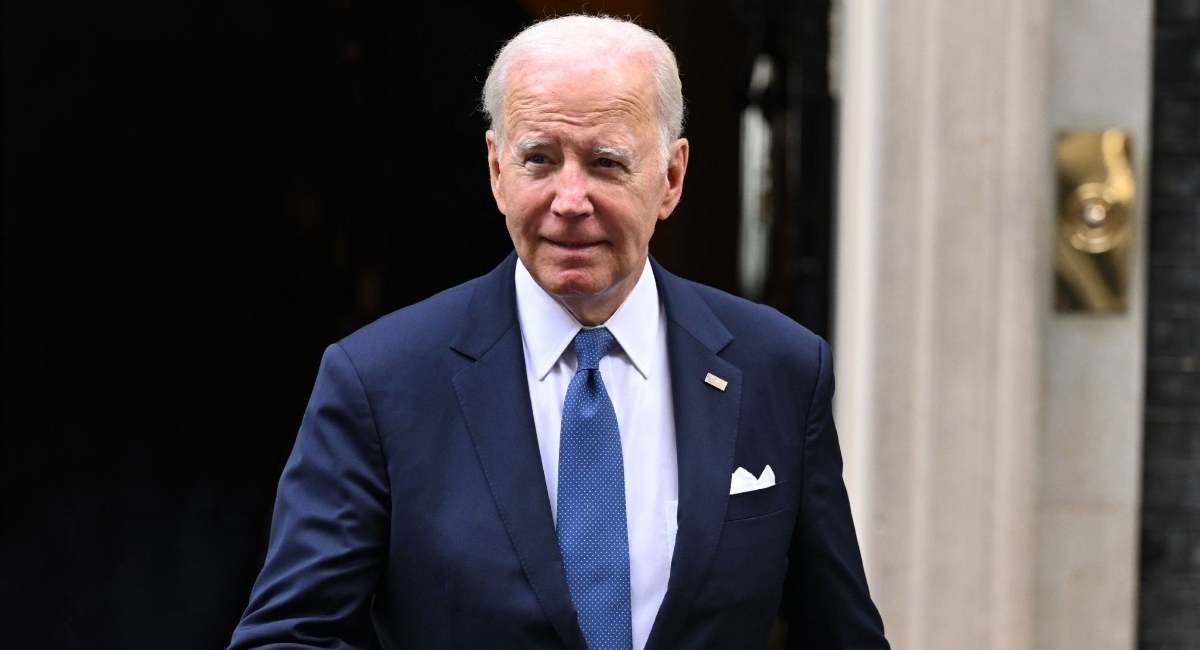 President Biden walking outside the White House