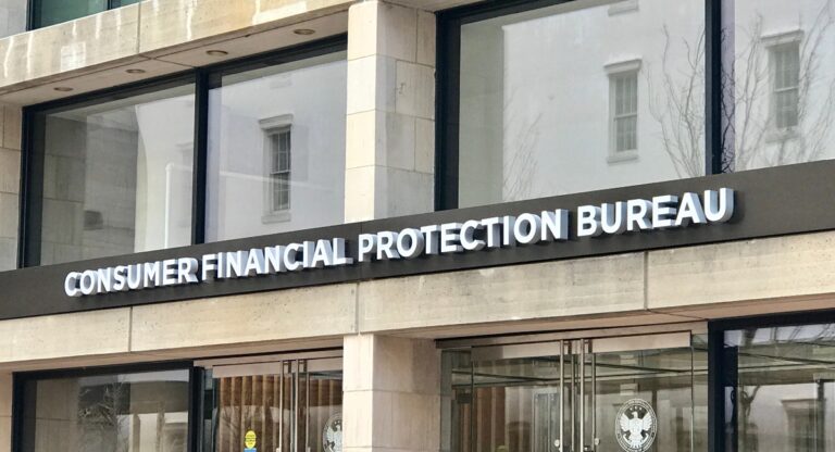 Consumer Financial Protection Bureau sign at entrance to building